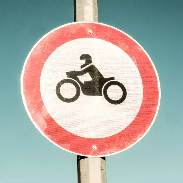 road sign motocycle
